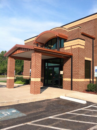 Covered Commercial Entryway with Metal Roof